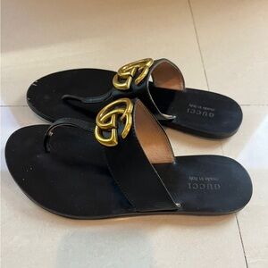 Gucci Black Leather Thong Sandals with Gold GG Accent